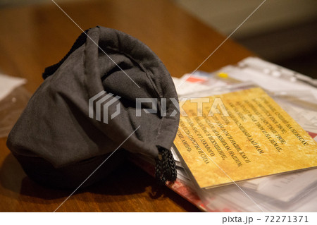 Money bag and a sheet of prayer Our Father. 72271371