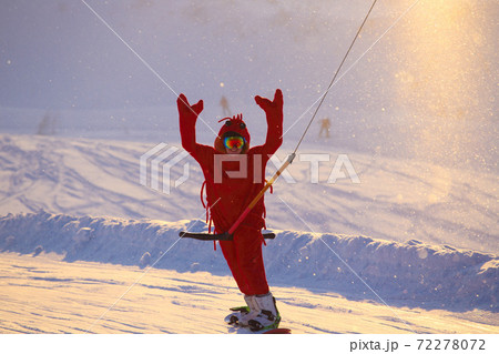 Snowboarder in funny shrimp costume 72278072