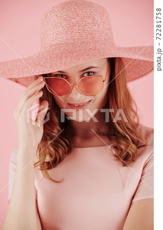 Smiling yuong red haired woman Smiling yuong red haired woman 72281758