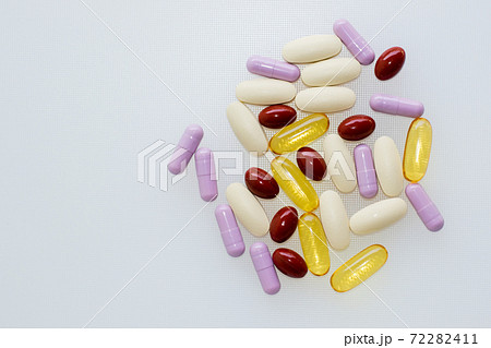 Multivitamins and supplements on white background, Including Vit Multivitamins and supplements on white background, Including Vit 72282411