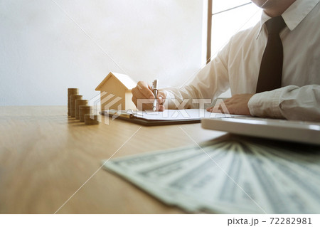 Businessmen calculate investment expansion business, saving money .finance concept . 72282981