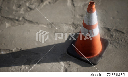 orange and white striped traffic cone 72286886