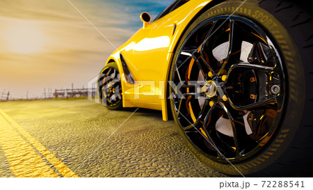 Sports car on paved road. Sports car on paved road. 72288541