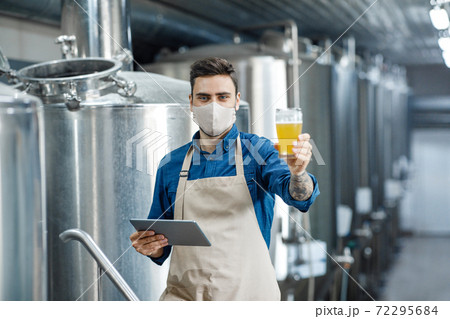 Beverage quality and color check at modern brewery Beverage quality and color check at modern brewery 72295684