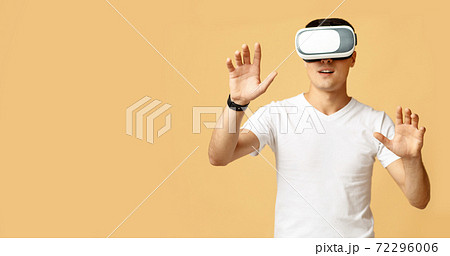 People lifestyle, hipster play in game. Surprised young student guy moves hands 72296006