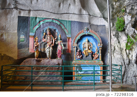 Batu Caves inside a limestone hill that has a series of caves and cave temples Batu Caves inside a limestone hill that has a series of caves and cave temples 72298316