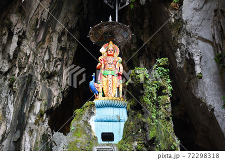 Batu Caves inside a limestone hill that has a series of caves and cave temples Batu Caves inside a limestone hill that has a series of caves and cave temples 72298318