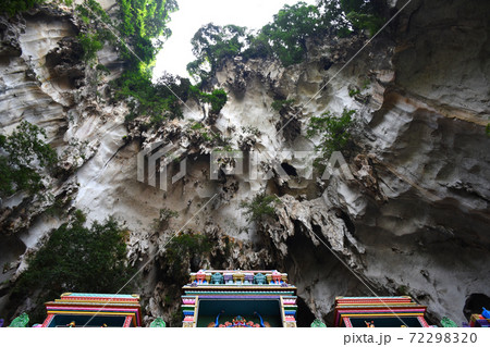 Batu Caves inside a limestone hill that has a series of caves and cave temples Batu Caves inside a limestone hill that has a series of caves and cave temples 72298320