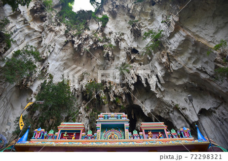 Batu Caves inside a limestone hill that has a series of caves and cave temples Batu Caves inside a limestone hill that has a series of caves and cave temples 72298321