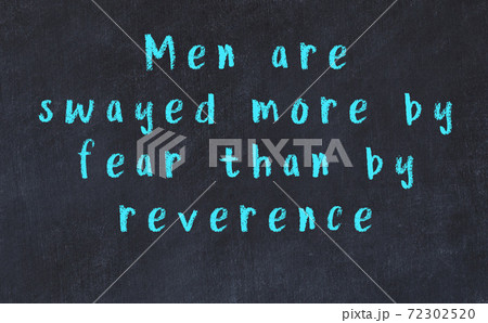 Black chalkboard with wise inscription on it 72302520