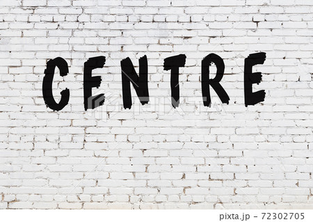 Word centre painted on white brick wall Word centre painted on white brick wall 72302705