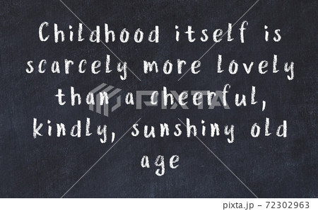 Black chalkboard with wise inscription on it Black chalkboard with wise inscription on it 72302963