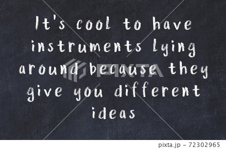 Chalk wise inscription on black chalkboard Chalk wise inscription on black chalkboard 72302965