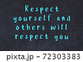Chalk wise inscription on black chalkboard 72303383