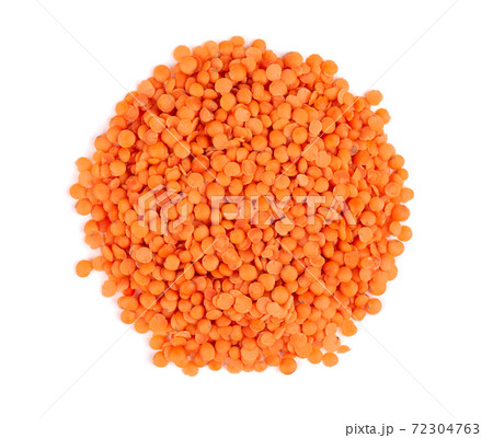 Red lentils isolated on white background. Top view. Red lentils isolated on white background. Top view. 72304763