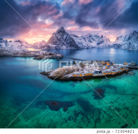Aerial view of Hamnoy at dramatic sunset in winter in Norway 72304821