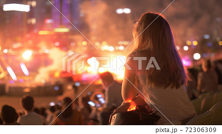 Woman Enjoys Concert 72306309