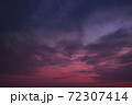 Dark red-violet sky at sunset as a backdrop 72307414
