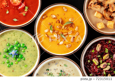 Vegan cream soup variety. Various vegetable soups, shot from the top Vegan cream soup variety. Various vegetable soups, shot from the top 72315011