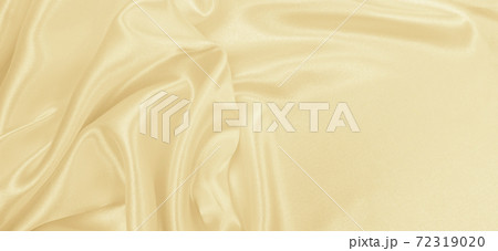 Smooth elegant golden silk or satin luxury cloth texture as wedding background. Luxurious background design. In Sepia toned. Retro style 72319020