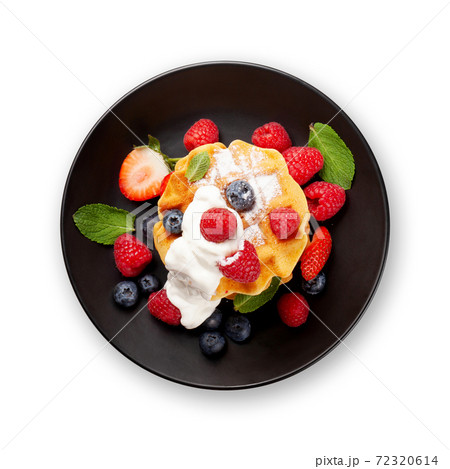 Delicious belgian waffles with summer berries 72320614
