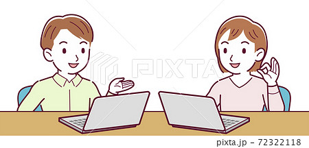 Men and women working on personal computers 72322118