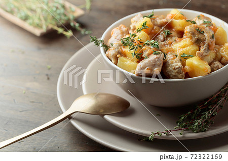 Irish stew sprinkled with green thyme. 72322169