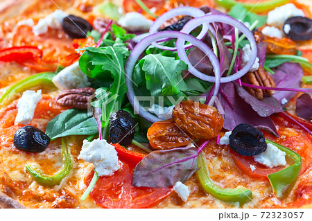 vegan pizza with onion and arugula vegan pizza with onion and arugula 72323057
