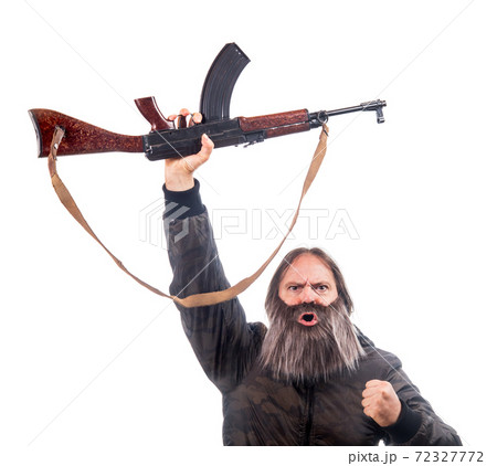 The bearded man rise kalashnikov isolated on a white background. The bearded man rise kalashnikov isolated on a white background. 72327772