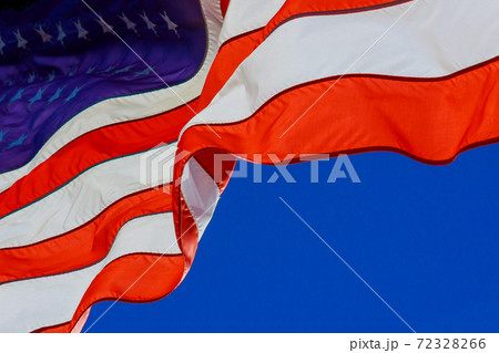 Flag of United States of America waving in the wind. Flag of United States of America waving in the wind. 72328266