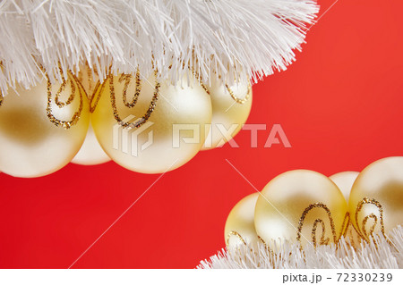 Christmas golden toys for greeting card on the red background 72330239