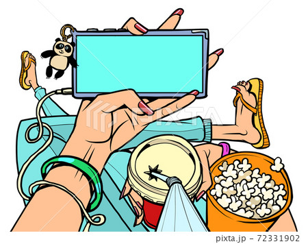 man with popcorn at home watching online movie theater. Home online movie theater, an online TV streaming video service 72331902