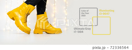 Banner made of stylish yellow boots. Trendy colors of the year Banner made of stylish yellow boots. Trendy colors of the year 72336564