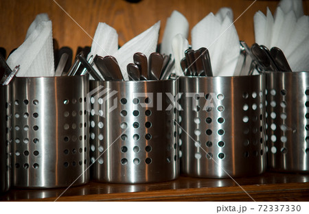 Metal glasses with cutlery and napkins , Metal glasses with cutlery and napkins , 72337330