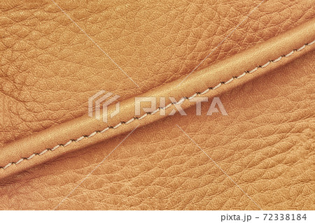Detail of handbag with stitching, vintage genuine leather of yellow brown color. Texture and background Detail of handbag with stitching, vintage genuine leather of yellow brown color. Texture and background 72338184
