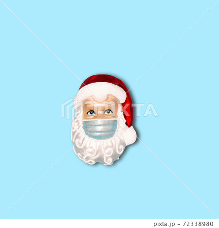 Christmas ornament Santa Claus wearing face mask Coronavirus health care Christmas ornament Santa Claus wearing face mask Coronavirus health care 72338980