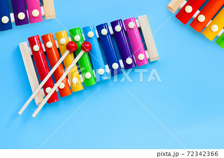 Colorful xylophone on blue background. 72342366