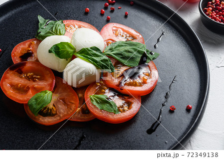Caprese fresh italian salad with tomatoes, 72349138