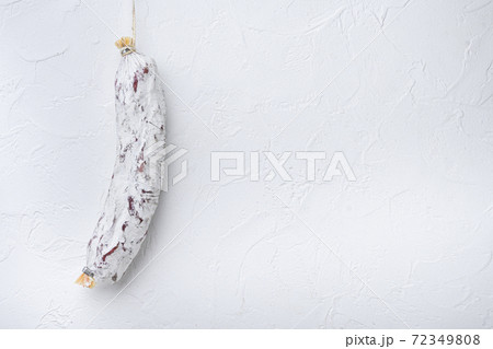 Salami sausage salchichon on white background with 72349808