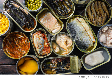 Assortment of canned preserves food in tin open Assortment of canned preserves food in tin open 72351045