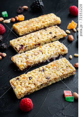 Healthy snacks, fitness lifestyle and high fiber diet concept,on black background Healthy snacks, fitness lifestyle and high fiber diet concept,on black background 72351220