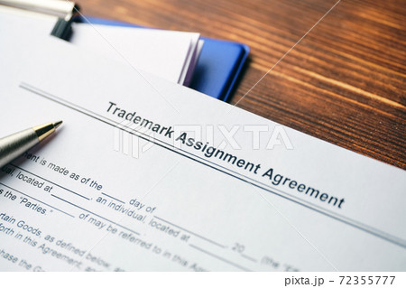 Legal document Trademark Assignment Agreement on paper close up Legal document Trademark Assignment Agreement on paper close up 72355777