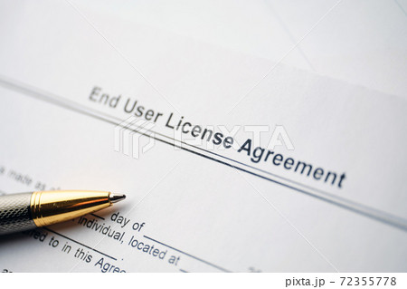 Legal document End User License Agreement on paper close up Legal document End User License Agreement on paper close up 72355778