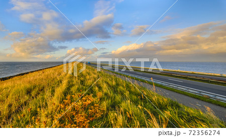 Afsluitdijk dutch dike sunset Afsluitdijk dutch dike sunset 72356274