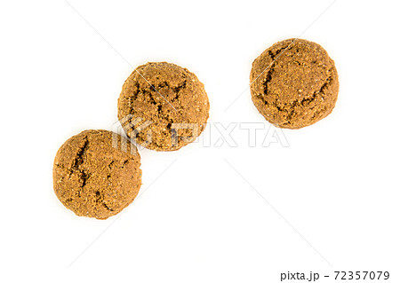 Three pepernoten treats top view on white background 72357079