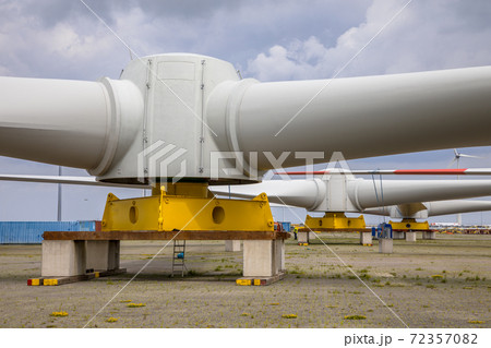 Three Giant rotors of wind turbine on construction yard Three Giant rotors of wind turbine on construction yard 72357082