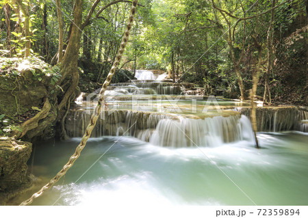 water fall in nature with green trees in Kanchanaburi, Thailand water fall in nature with green trees in Kanchanaburi, Thailand 72359894