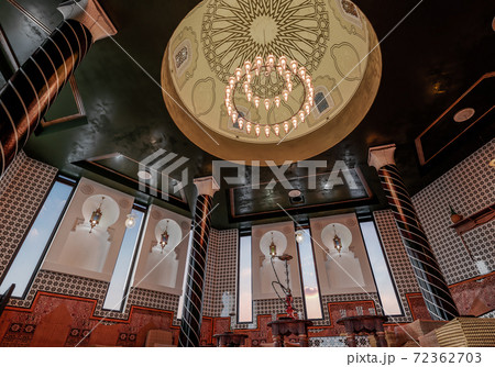 Hookah hall in Arabic style. Oriental interior design. Moroccan style in the interior. 3d illustration. Hookah hall in Arabic style. Oriental interior design. Moroccan style in the interior. 3d illustration. 72362703