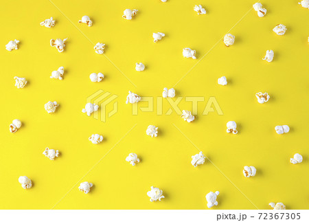 Popcorn pattern on yellow background. Popcorn pattern on yellow background. 72367305
