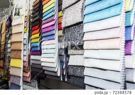 A set of fabric samples for furniture finishing. Multicolored upholstery stripes. 72368578